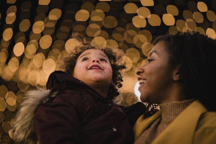 A mother and daughter admire the Nights of Lights in St. Augustine