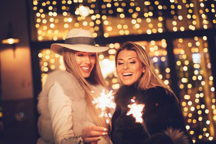 women with sparklers